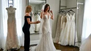 Julia in a wedding dress.