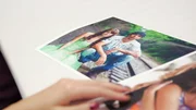 A photo of Jeremiah and his girlfriend in a scrapbook.