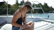 Recreation of Laurie Winkel (Serena) writing on deck.
