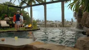 Lucas Congdon with Jerry Raffa and Janet Raffa on their new pool island.