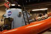 Moutain View, CA: NASA:  The Ames Vertical Gun Range (AVGR) was designed to conduct scientific studies of lunar impact processes in support of the Apollo missions.