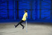 Chima Akenzua demonstrating how crutches can act as an inverted pendulum.