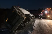 Pulling the truck up from its side.