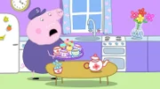 Zu Hause bereitet Opa Wutz Tee und Kuchen vor, um die Astronauten zu empfangen. Oma Wutz, Peppa und Schorsch spielen heute die Apollo Mondlandung nach.