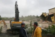 Claremont, NH, USA: Brian Gurry and Lee Danley discussing the plan for the demolition.