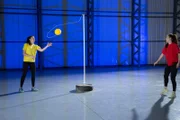 Emily and Bailey playing tetherball.