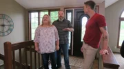 David Bromstad and winners.isnt it fantastic? By the entrance of one possible house