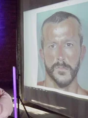 Images on the screen: Chris Watts.