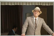 E. Howard Hunt (Woody Harrelson)