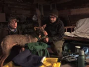 Jessi Morse and Chris Morse look disappointed as they pack up their cabin to try and make it back to civilization.