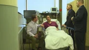 Dan tells detectives his story from the hospital bed.