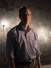 Dr. Paul Jaffe, Ph.D., a spacecraft engineer at the U.S. Naval Research Laboratory works on designing a space solar power system in his lab.