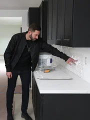 Tarek and Christina check out the newly installed backsplash in this kitchen in Highland Park, CA. As seen on HGTV's Flip or Flop.