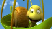 Die Schnecke Rufus fliegt hoch am Himmel.