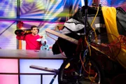 Woozle will das spannendste Video der Welt produzieren und will gleich mehrere Sportarten kombinieren - er möchte einen Katapult-Trampolin-Fallschirm-BMX-Skatebord-Zehnfach-Salto schaffen. Ganz Woozlingen wartet auf das Video!