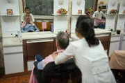 On the chair: Michael Palin