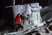 Overhalla, Norway - Jo Roger next to the overturned plow truck.