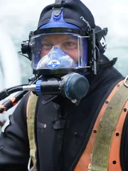 James Hamm in dive suit in Nugget creek
