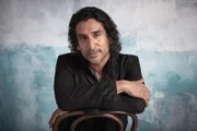 Julian Cousins (Naveen Andrews)