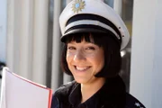 Polizistin Josephine (Mira Mazumdar) freut sich, als ihre Arbeit von den Lansingern gewürdigt wird.