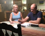 A recreation of Bernard and Patti arguing over bills.
