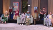 Shaeeda crying, holding baby clothes on set