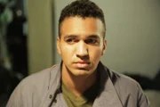 Michael Blanco waits to speak to his mother in prison.