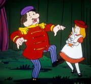 Alice und der Zirkusdirektor erstarren vor Schreck. Ein fürchterliches Brüllen kündigt an, dass der grausame Fred sich aus dem Löwenkäfig befreit hat.