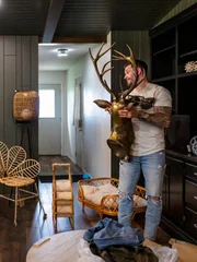 As seen on HGTV’s Farmhouse Fabulous, Chelsea and Cole DeBoer are installing the showstopper antler chandelier in the family room at the Kerher-Ligtenberg’s home.
