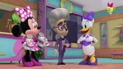 First on the left:  Minnie Mouse, first on the right: Daisy Duck