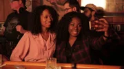 Jill and her friend take a selfie at the bar.