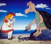 Die falsche Suppenschildkröte will Alice die traurige Lebensgeschichte der Austern erzählen, doch sie muss so heftig weinen, dass sie kein Wort herausbekommt.