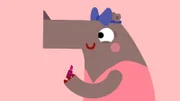 Die Nashornfrau schminkt sich die Lippen.