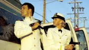 Harmon Rabb, Jr. (David James Elliott), Meg Austin (Tracy Needham)