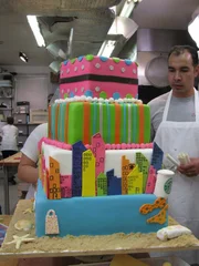 Remy Gonzalez adds reinforcements to the Sweet 16 cake.