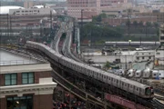 The R160 arrives at the Queenboro plaza station in Long Island City, NY.