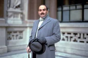 David Suchet (Hercules Poirot).