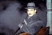 David Suchet (Hercules Poirot).