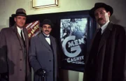 Agatha Christie's Poirot [2] Episode 8 - The Kidnapped Prime Minister Poirot is called in at the highest level when the British Prime Minister is kidnapped in France en route to a disarmament conference. The kidnap has been preceded by a gun attack on the PM as he travelled down on the boat train after seeing the King at Windsor. With only 32 hours to go before the conference is due to start, Poirot confounds the government by refusing to cross the channel and pursuing his investigation in England.  L-R: Captain Hastings (HUGH FRASER), Hercule Poirot (DAVID SUCHET) and Chief Inspector Japp (PHILIP JACKSON) © Granada plc