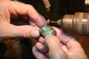 Holding opal.