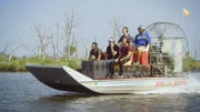 Justin and Emiliano sitting on a fan boat.