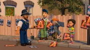 Norman und Mike überbieten sich im Aufhängen von Plakaten für ihre Shows. Polizist Malcolm und Mandy versuchen zu schlichten.