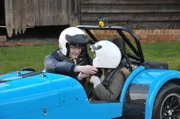 Photograph of nominee Jason in his newly restored Caterham 7, pictured with his daughter.