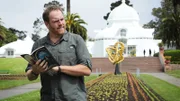 Josh Gates searches for a treasure from the book The Secret in Golden Gate Park of San Francisco, California.