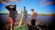 Jay, Brian, and Chris pose at edge of cenote.