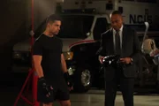 L-R: Nick Torres (Wilmer Valderrama), NCIS Director Leon Vance (Rocky Carroll)