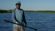 Thad Robinson paddling a boat in Mexico.