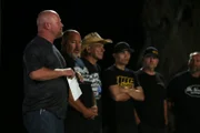 The Reaper present his vehicle title to the 405 team and challenges anyone to inspect his car.