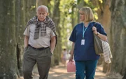 Harvey Keitel as Lali Sokolov and Melanie Lynskey as Heather Morris walking through the streets of Melbourne.
