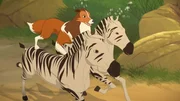 In einer spektakulären Aktion hat Lassie die ausgebrochenen Zebras unter ihre Kontrolle gebracht und galoppiert mit ihnen zurück zum Zirkuszug.